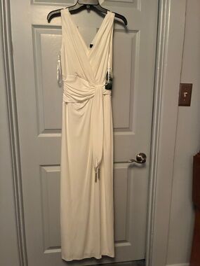 Lauren Ralph Lauren White V neck maxi gown with slit front and draped waistline.
